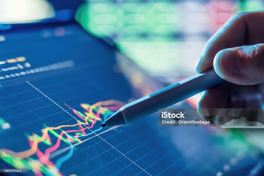 businessman use tablet and smart phone for stock market